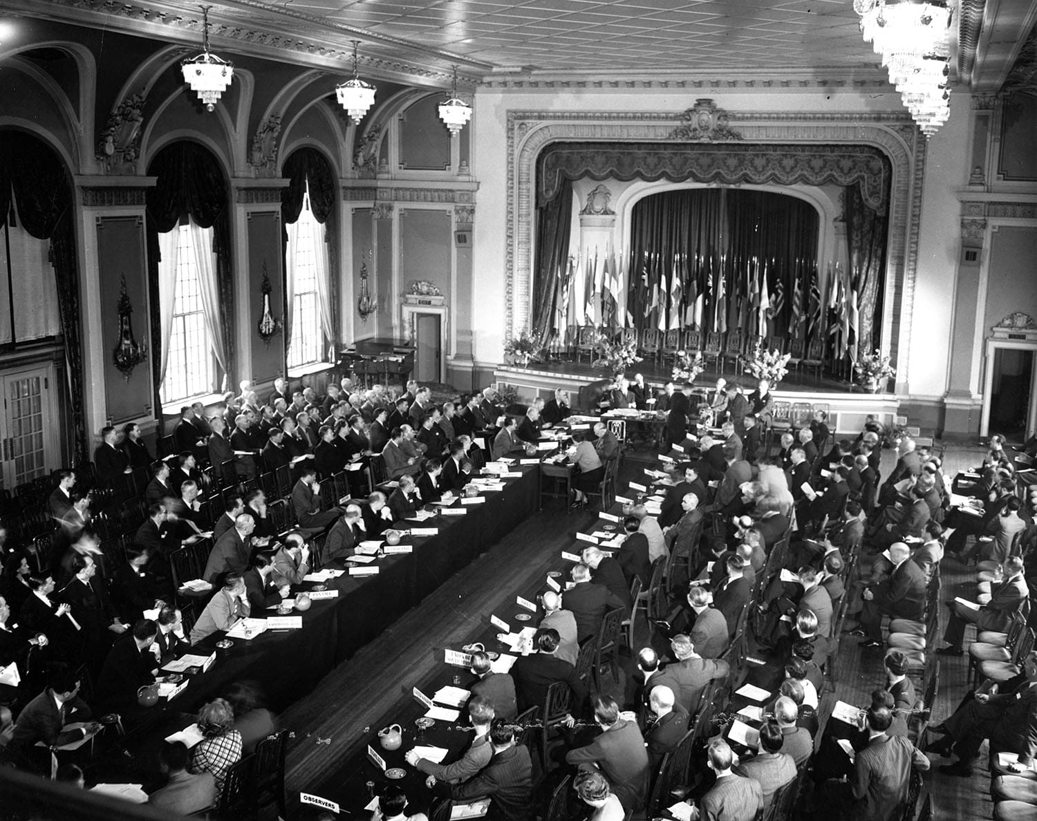 John Boyd Orr, seen in profile, speaks from a lectern