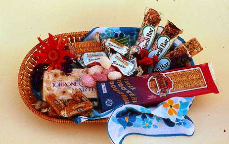 Torrone and various nut, sesame seed and granola bars made with honey.