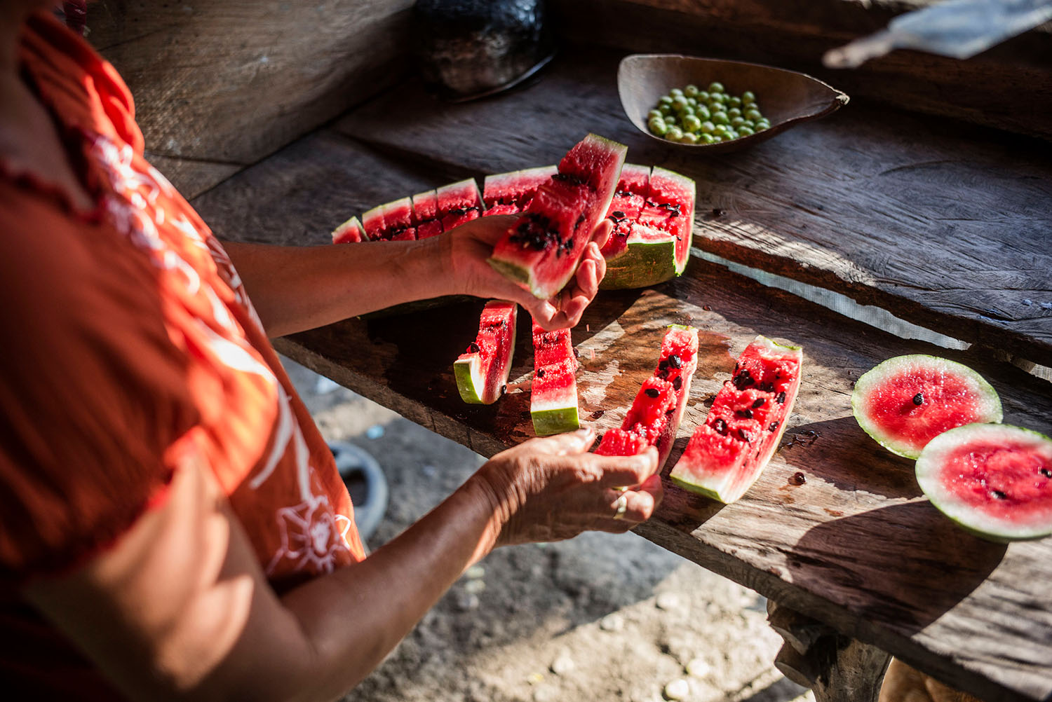 Cut watermelon glows in the morning light